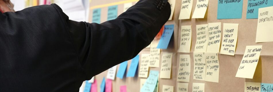 sticky notes on corkboard